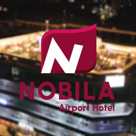 Nobila Airport Hotel Cotonou Bagian luar foto